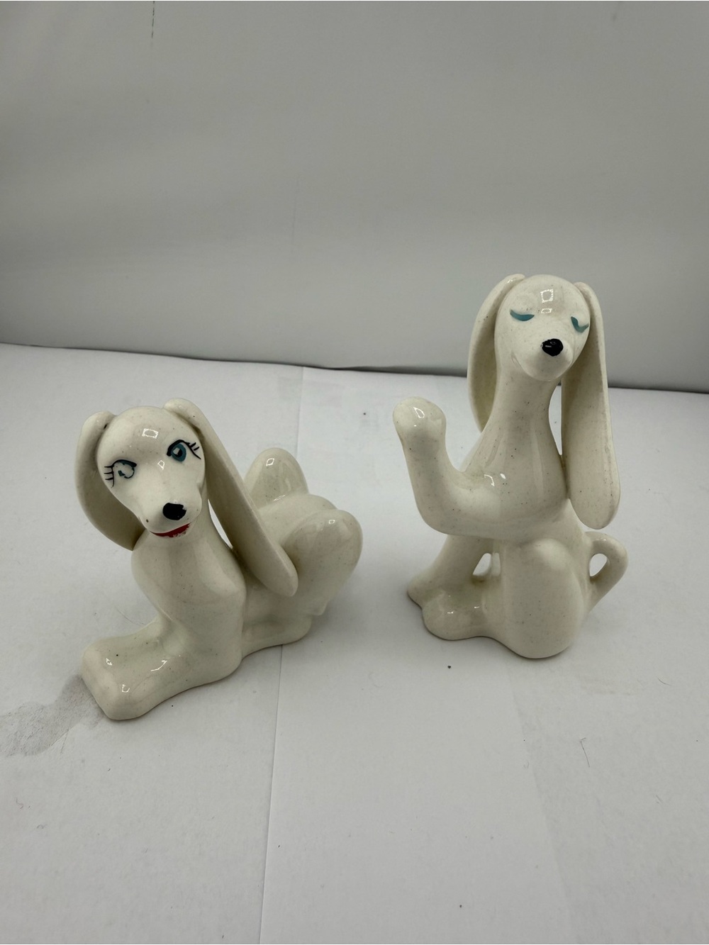 Vintage mid-century white ceramic hound dog figurines